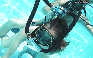 Japanese scuba girl underwater