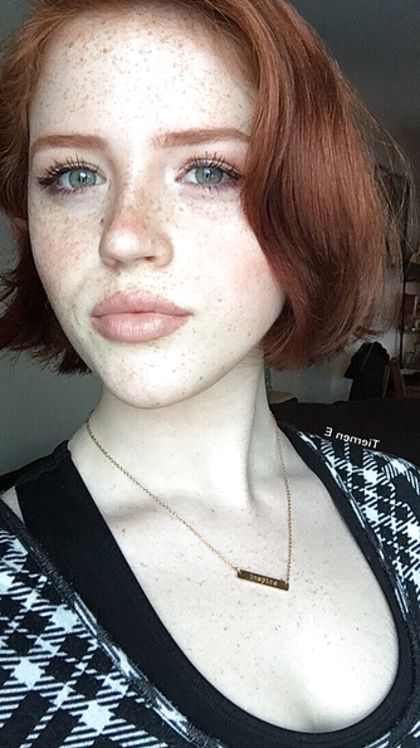 Freckled ginger teen
